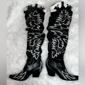 Thigh high cowboy boots